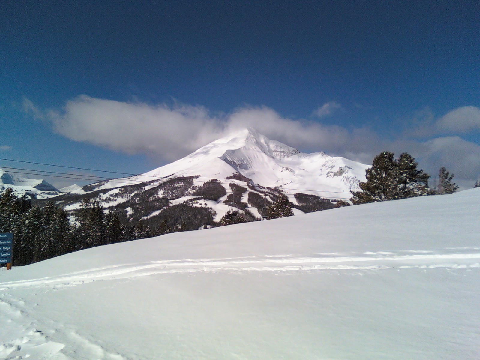 Lone Peak rising above the Big Sky Resort ski area in winter