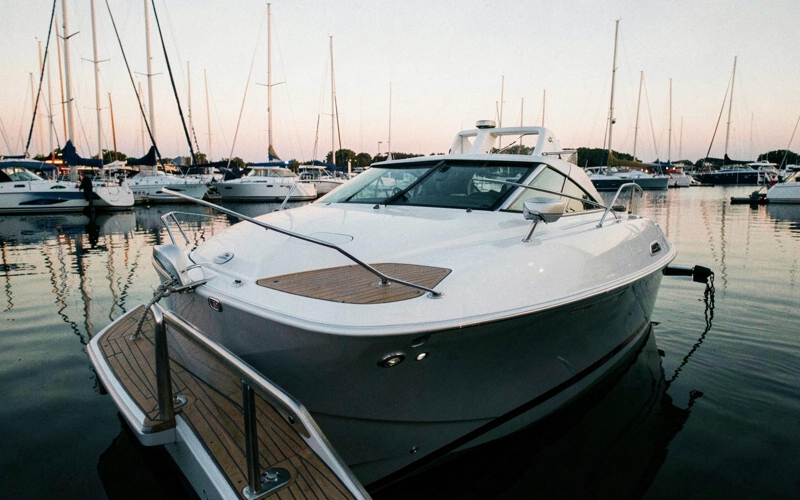 Yachts moored in a quiet marina