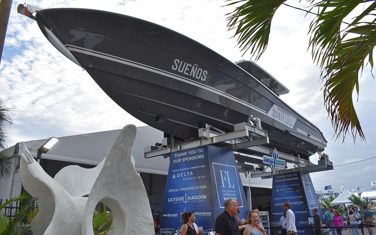 A performance boat displayed on a stand at the Fort Lauderdale International Boat Show