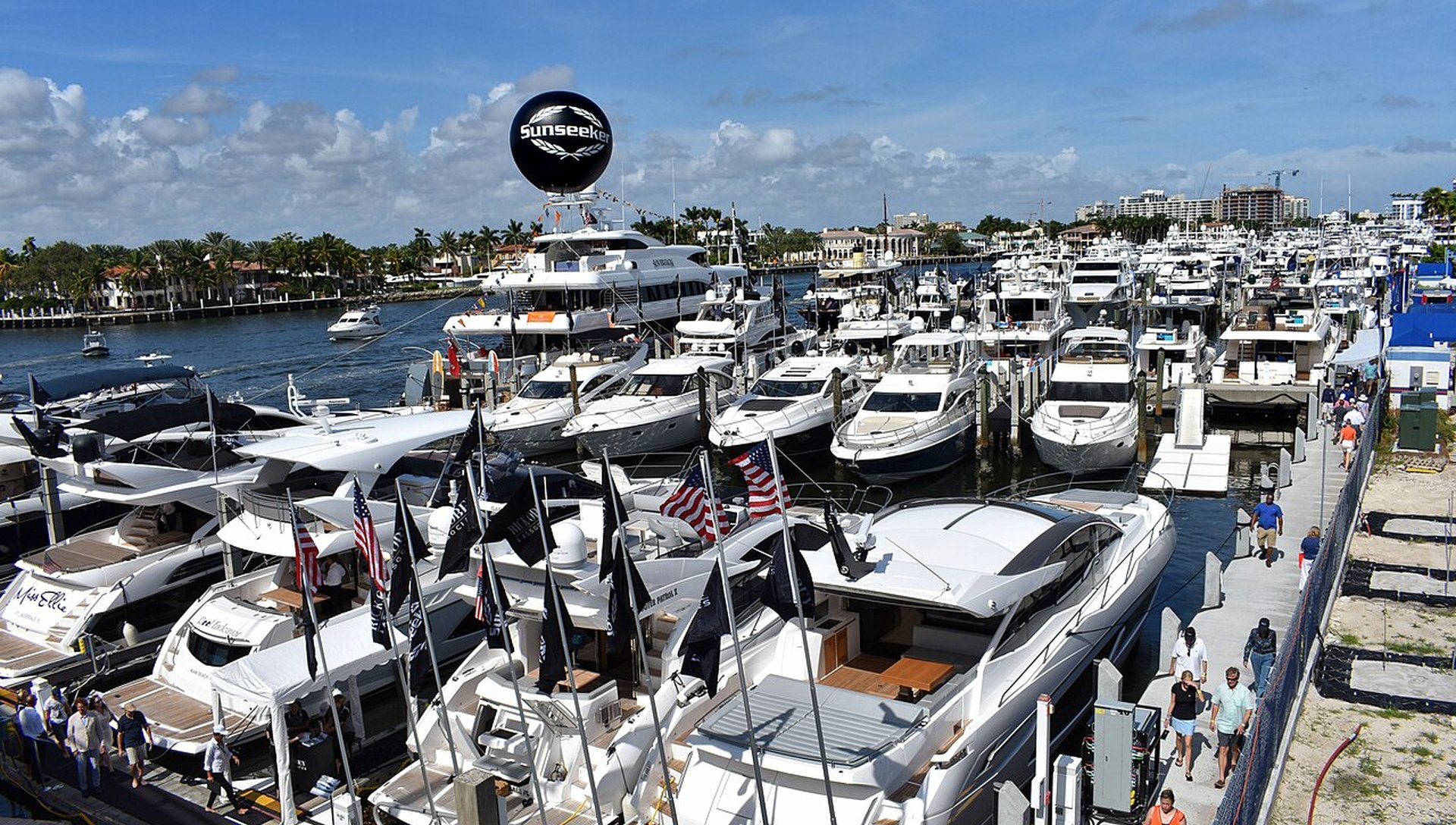 Rows of yachts docked along a Fort Lauderdale marina during the boat show