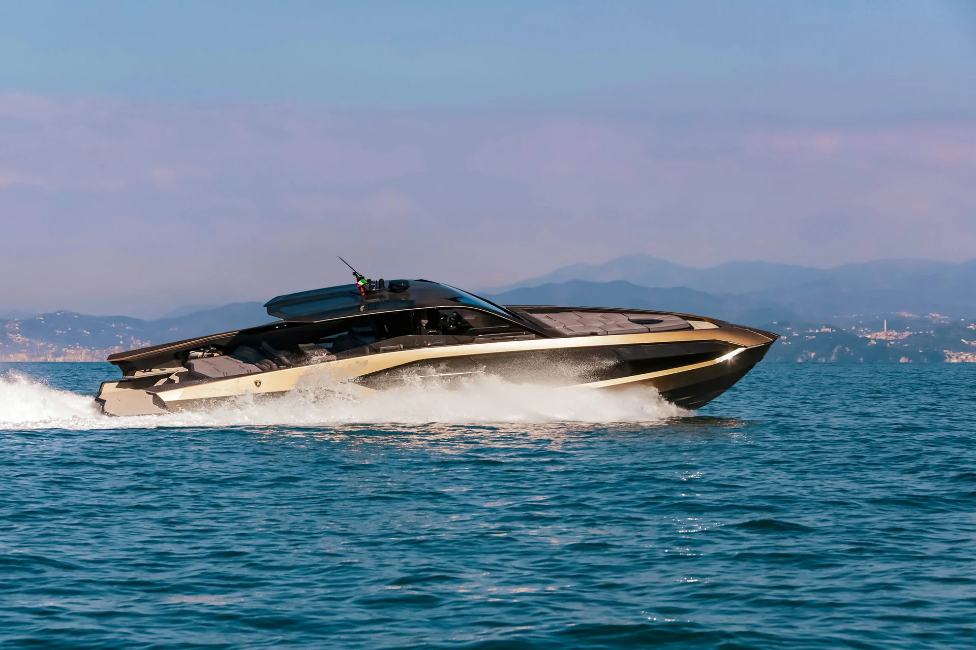 Tecnomar for Lamborghini 63 running hard across open water