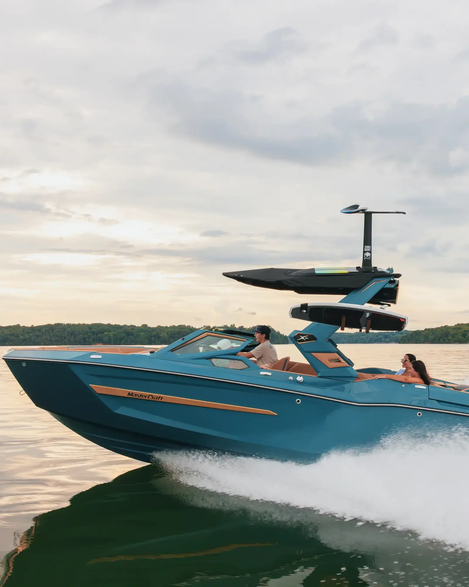 2026 MasterCraft X24 underway in late-afternoon light
