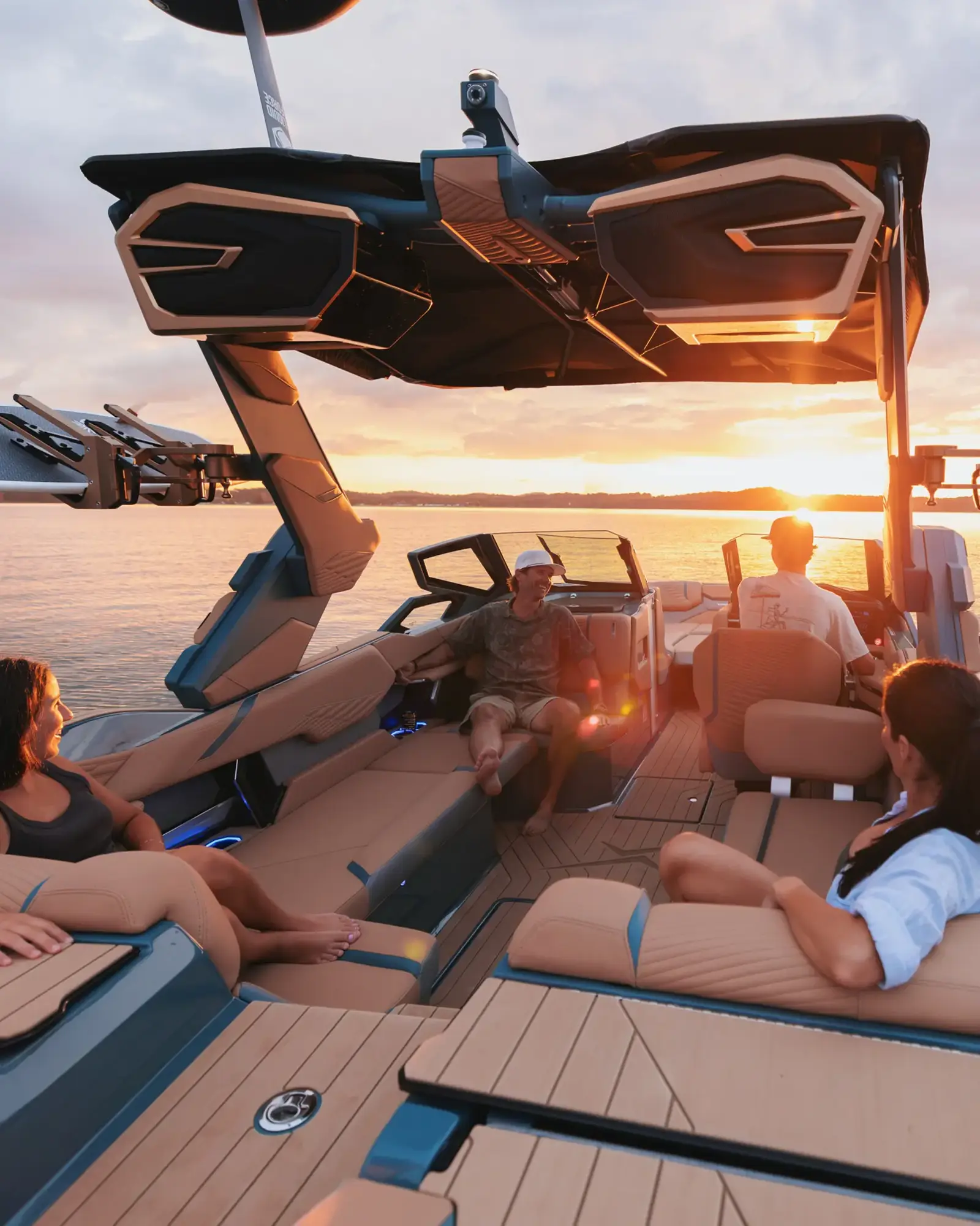 Friends relaxing in the cockpit of the X24 at sunset
