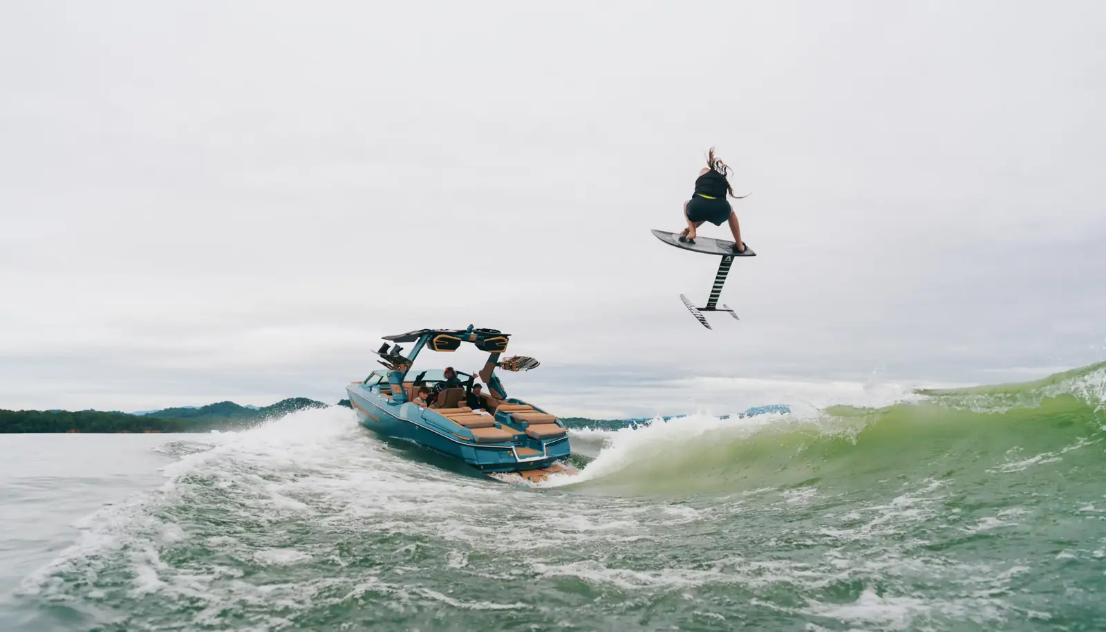 Wakesurfer carving behind the 2026 MasterCraft X24