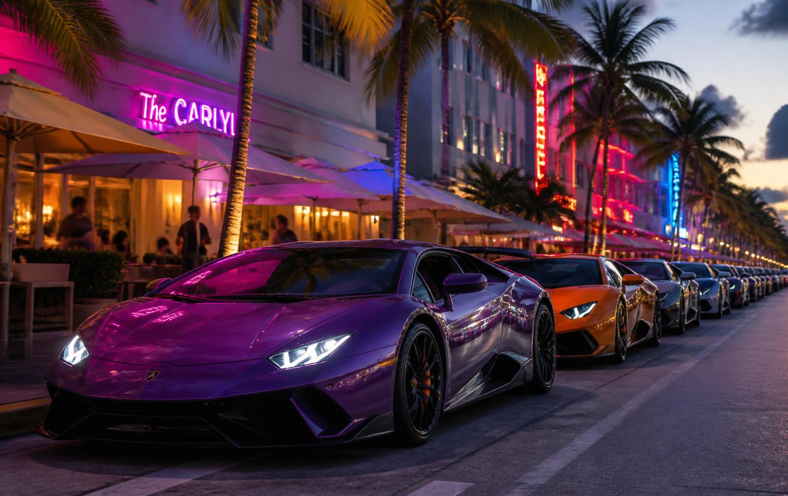 Row of supercars parked along a neon-lit Miami street at dusk