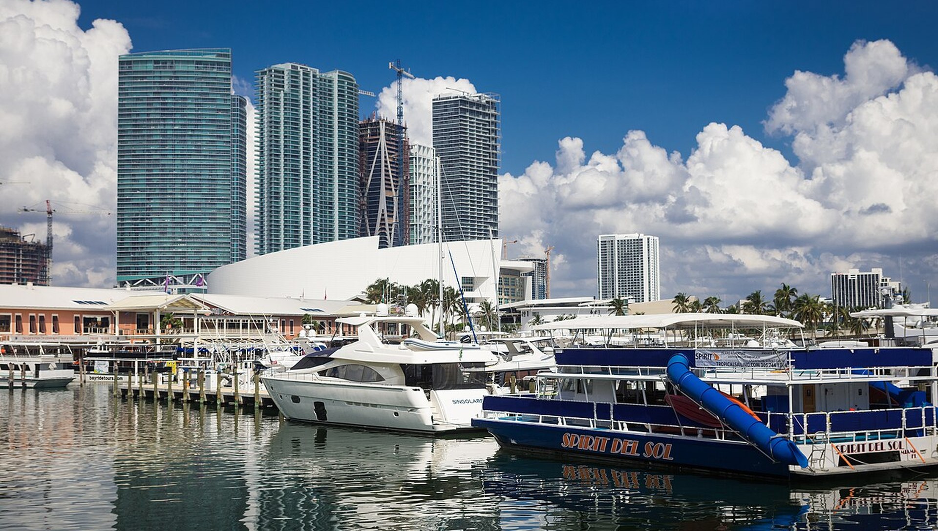 Aerial view of a Miami marina full of yachts on Biscayne Bay with the skyline behind