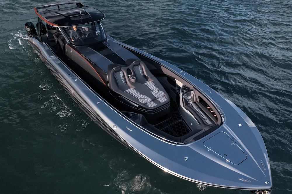 Aerial profile of an MTI performance boat underway