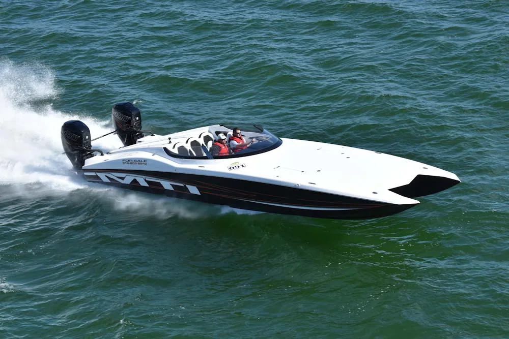 MTI catamaran running hard through open water