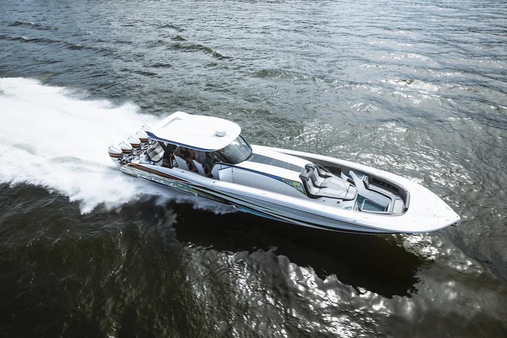 MTI catamaran at speed, hull clear of the water
