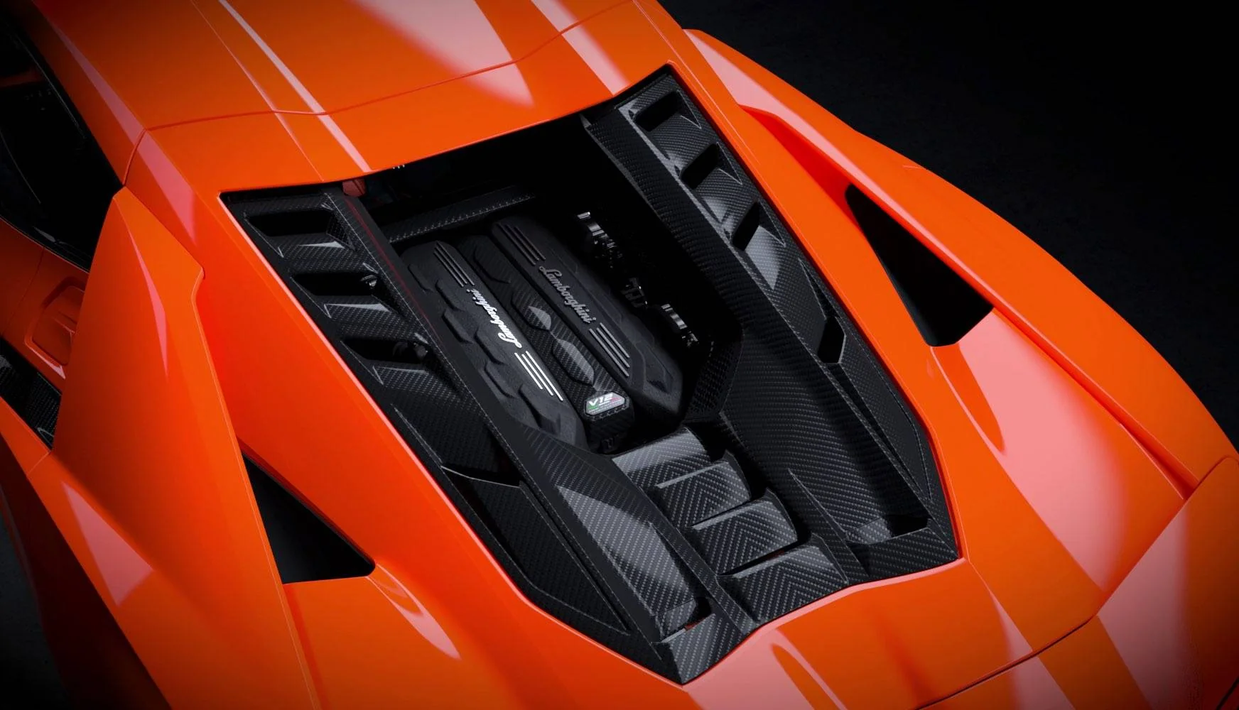 Exposed V12 engine bay of the Lamborghini Revuelto beneath its rear deck