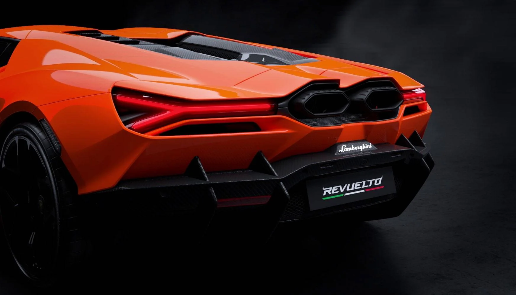 Rear three-quarter view of the Lamborghini Revuelto showing its high-mounted exhaust