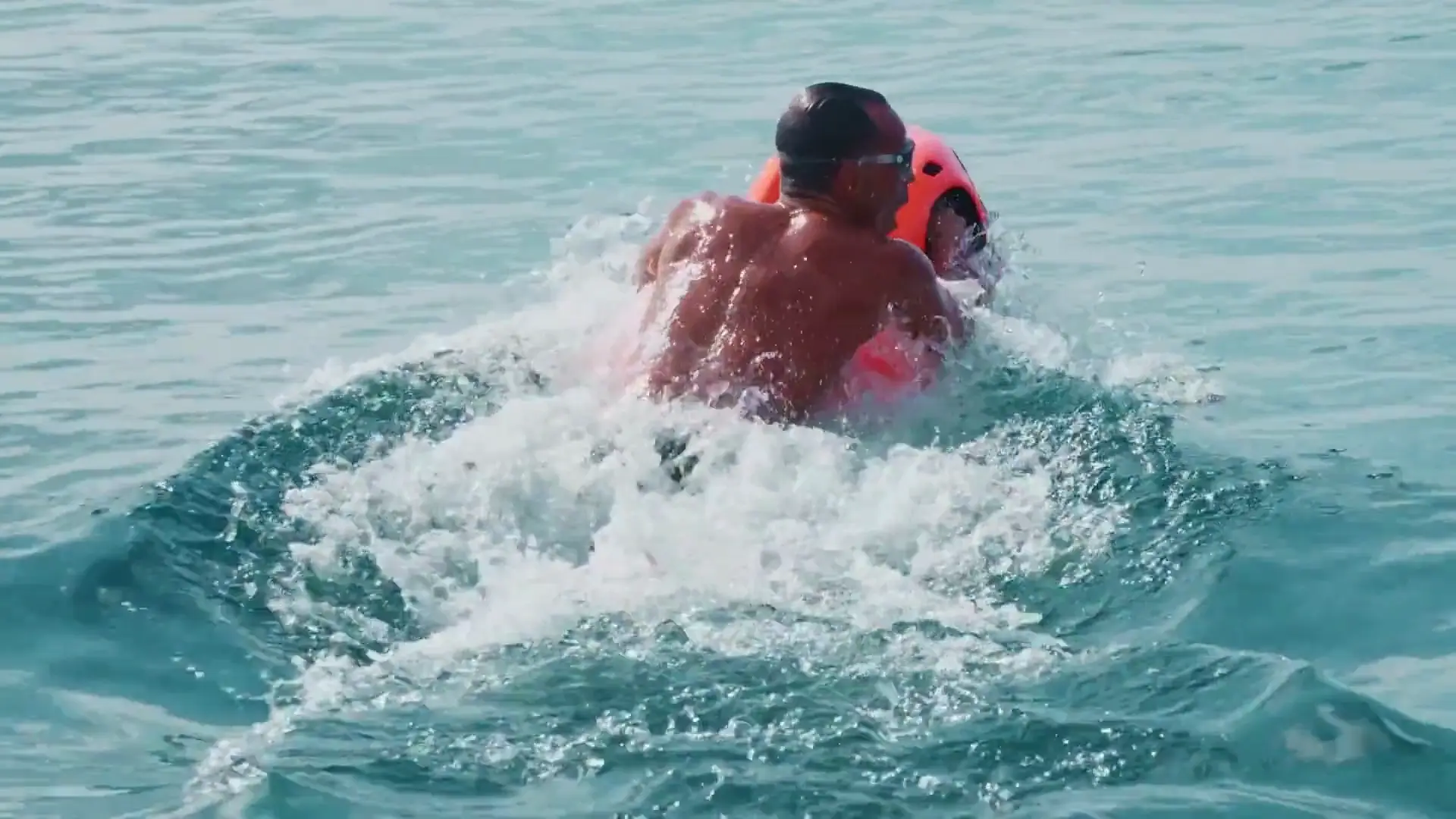 Rider driving a SEABOB across open water