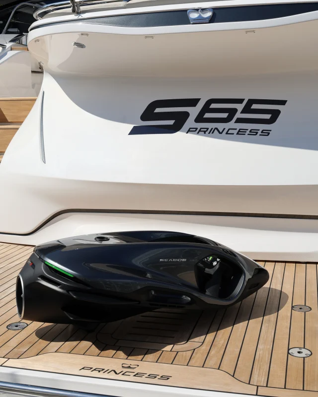 SEABOB stowed on the teak swim platform of a yacht