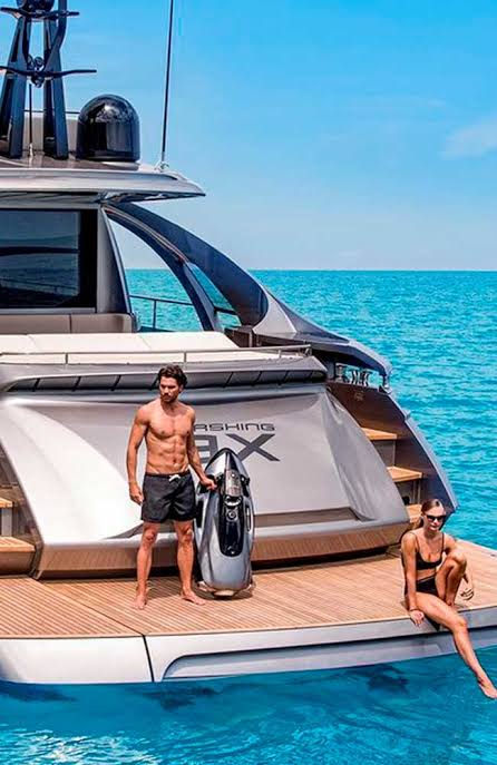 SEABOB resting on the teak swim platform of a yacht at anchor