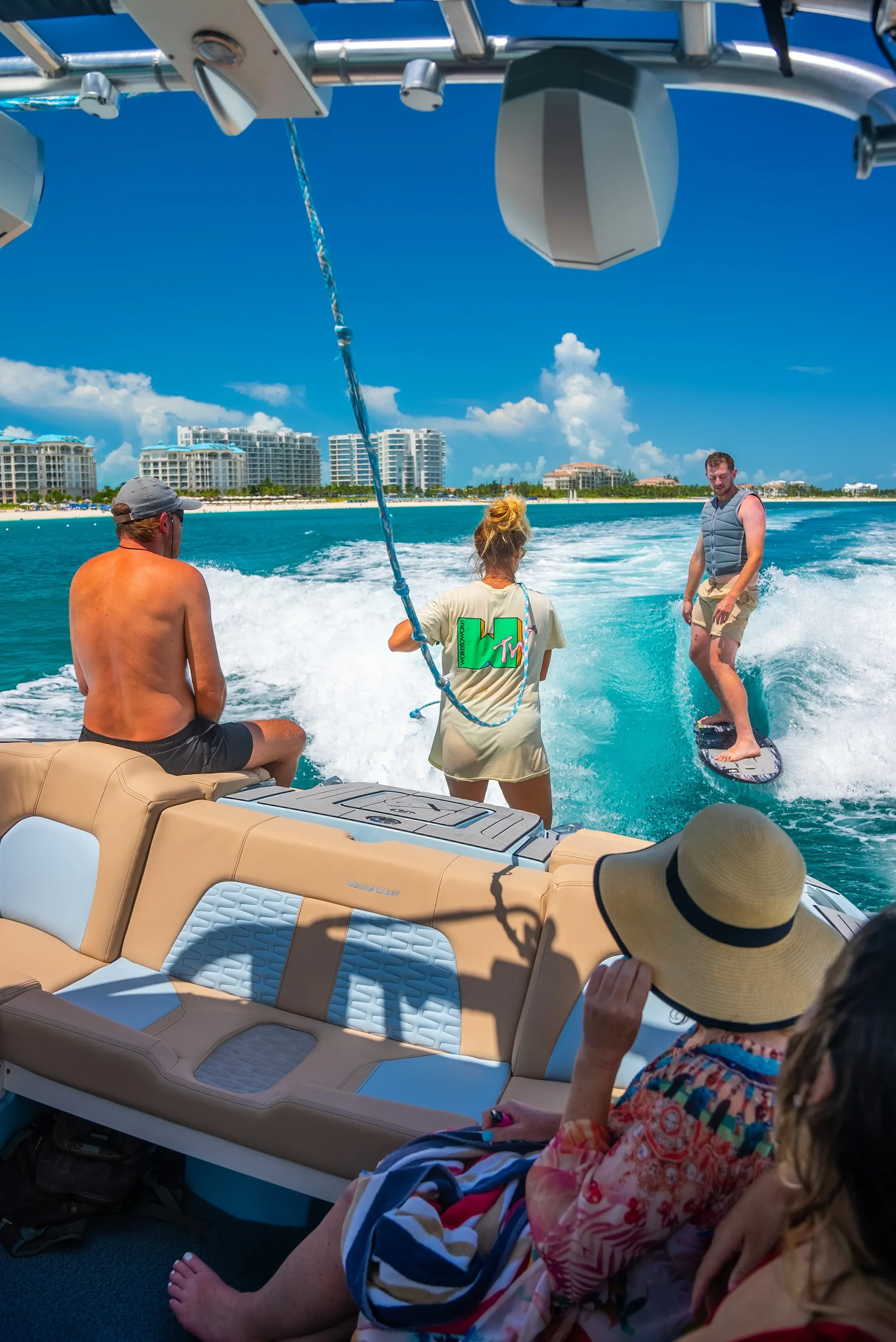 Guests and crew aboard a Wake to Wake boat during a session