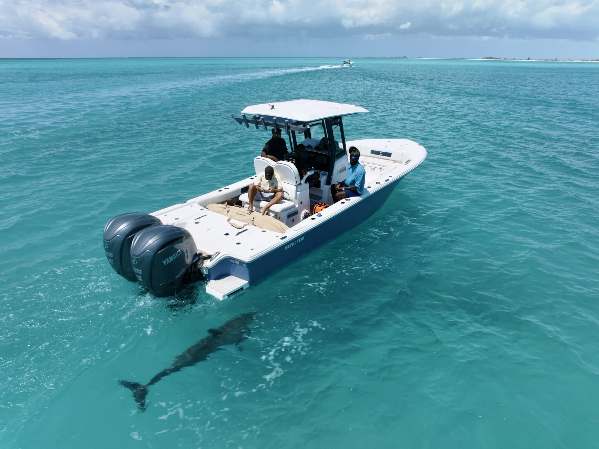 Wake to Wake exploring charter boat underway with guests aboard